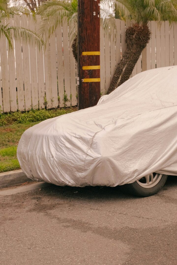 Covered Cars on Parking Lot.
