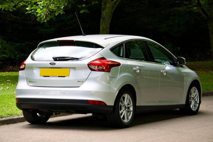A Silver Ford Focus Parked on the Side of a Street.