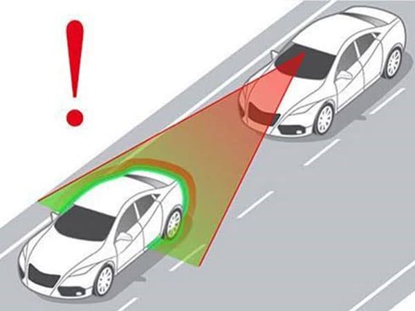 Advanced Driver Assistance System technology showing car in front of moving vehicle.