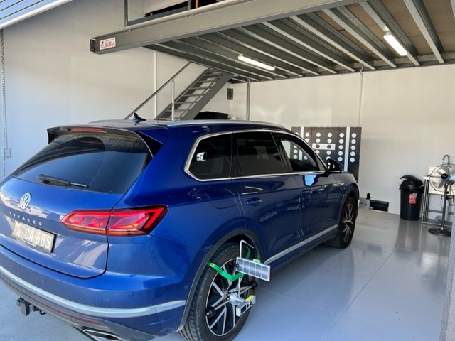 Blue Volkswagen getting an static ADAS calibration