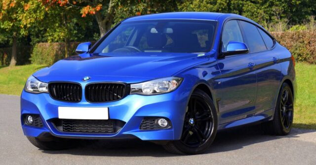 A blue modern car with a new windscreen.