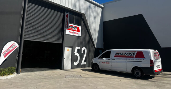 Outside of Metro Auto Glass workshop at Strathfield South in NSW, with signage and work vehicle out the front.