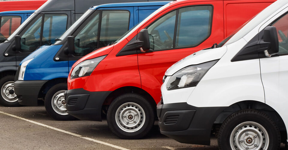 Row of vans showing their side windows