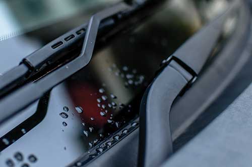 Close up of windscreen wiper blades and rubber seal