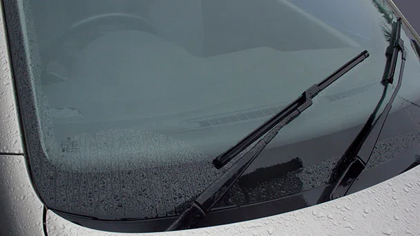 Windscreen wipers on car